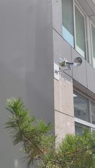 Video loop showing the Ecobarbet™ Bird Deterrent Spinner rotating smoothly in a light breeze. Mounted on a wall to demonstrate the flashing reflective cups in action.