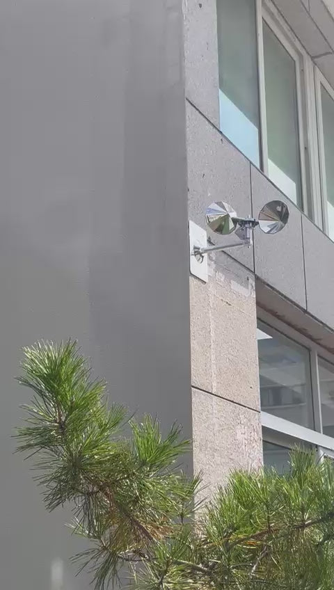 Video loop showing the Ecobarbet™ Bird Deterrent Spinner rotating smoothly in a light breeze. Mounted on a wall to demonstrate the flashing reflective cups in action.