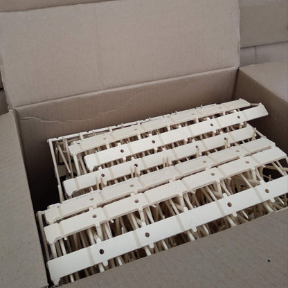 Cream bird spike in box
