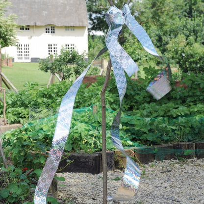 Use bird scare tape in vegetable gardens to get rid of birds